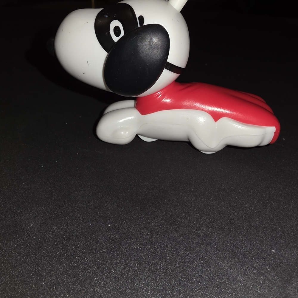 Red and White Cartoon Dog Figurine